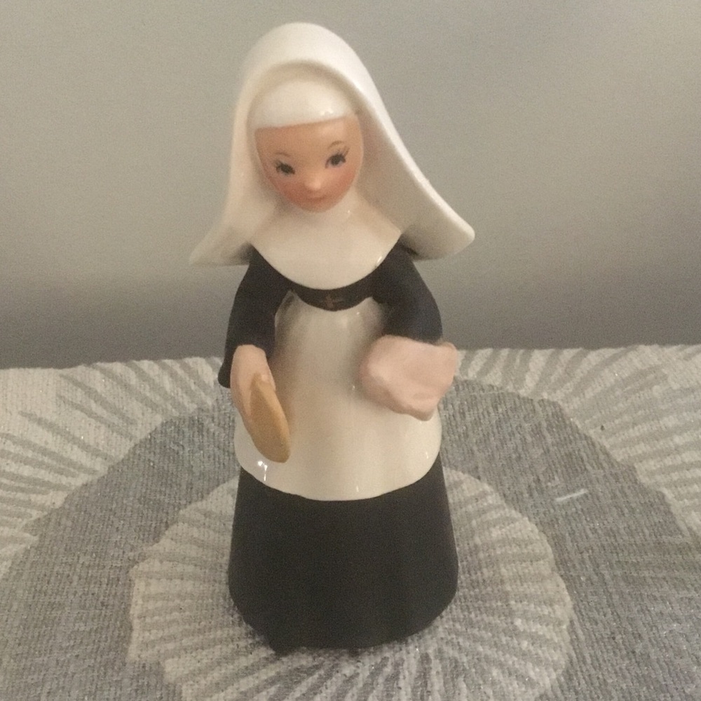 Porcelain Nun Figurine in White and Black 
Vintage